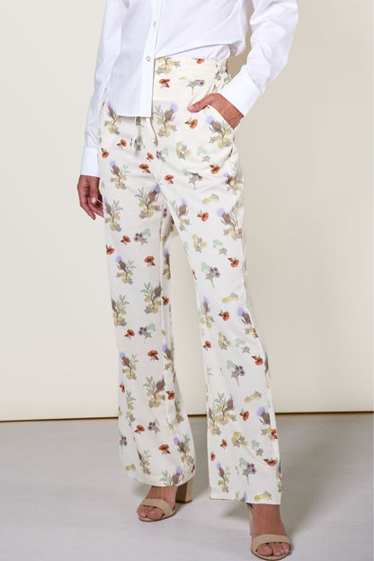 Pantalon anti-UV floral pour femme, léger et élégant, certifié UPF 50+, parfait pour les sorties ensoleillées.