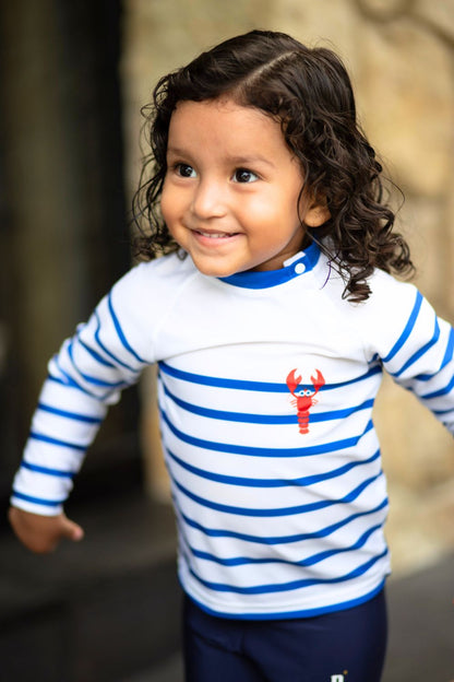 T-shirt de bain anti-UV à rayures bleues pour garçon, léger et confortable, offrant une protection solaire UPF 50+.