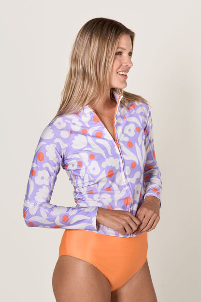 Veste de bain anti-UV pour femme, manches longues, motif floral violet, idéale pour protéger du soleil.